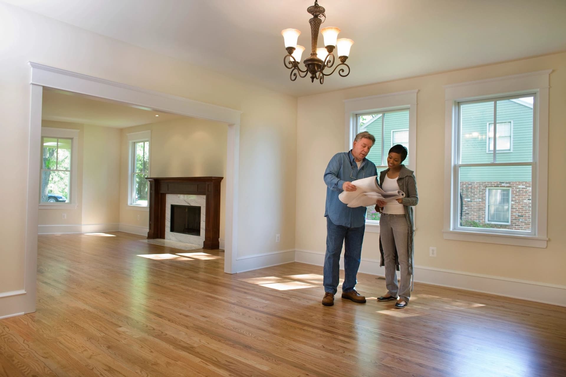 Homebuyers reviewing an inspection report